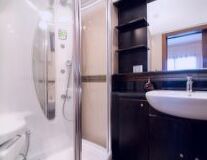 indoor, sink, plumbing fixture, tap, bathtub, home appliance, kitchen, countertop, mirror